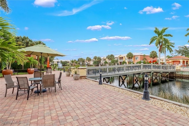 view of patio / terrace with a water view