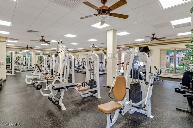 exercise room featuring a drop ceiling