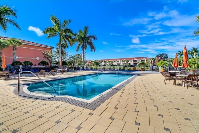 view of pool with a patio area