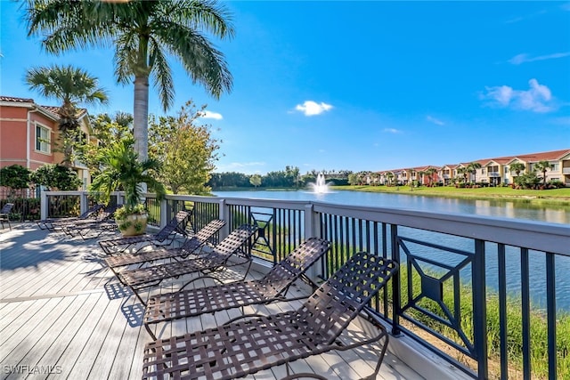 wooden terrace with a water view