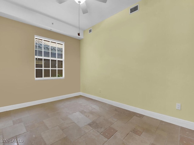 empty room featuring ceiling fan