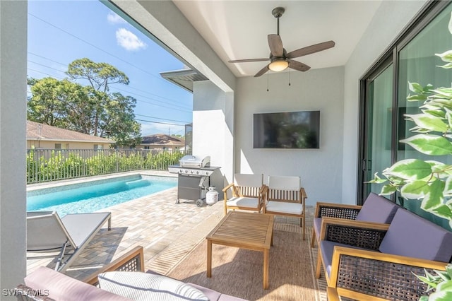 exterior space featuring outdoor lounge area, ceiling fan, and a patio area