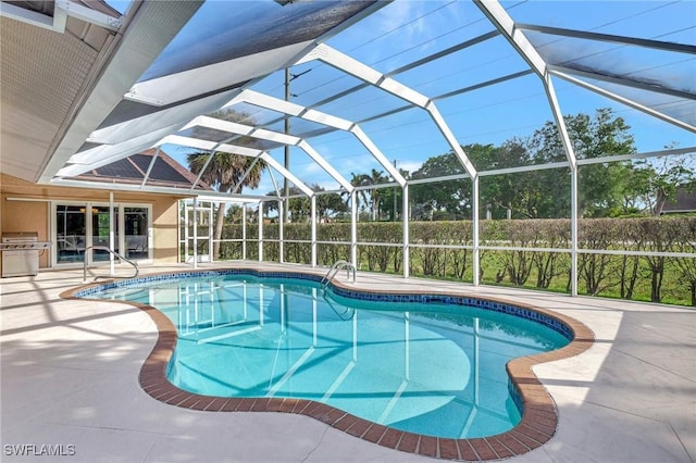 view of pool featuring a lanai, a patio area, and area for grilling