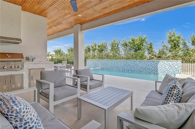 view of patio with a grill, an outdoor living space, area for grilling, and fence