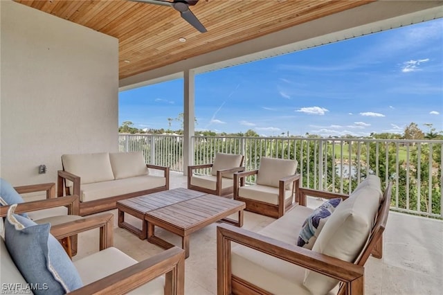 view of patio featuring an outdoor living space and a ceiling fan