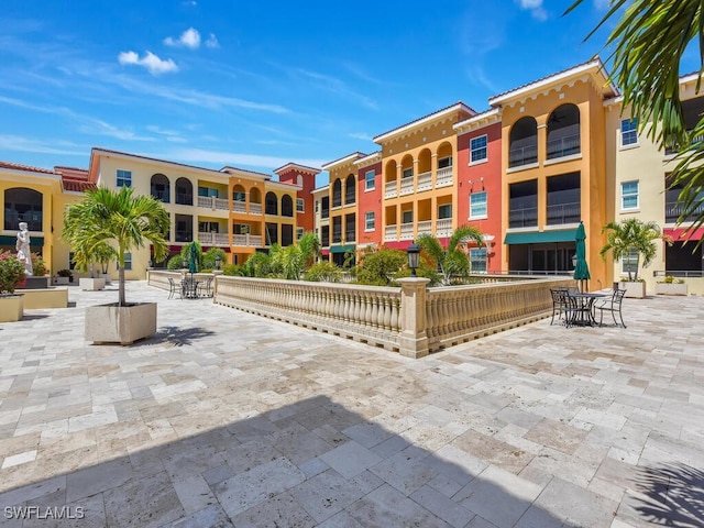 view of home's community with a patio area