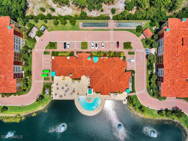 bird's eye view with a water view