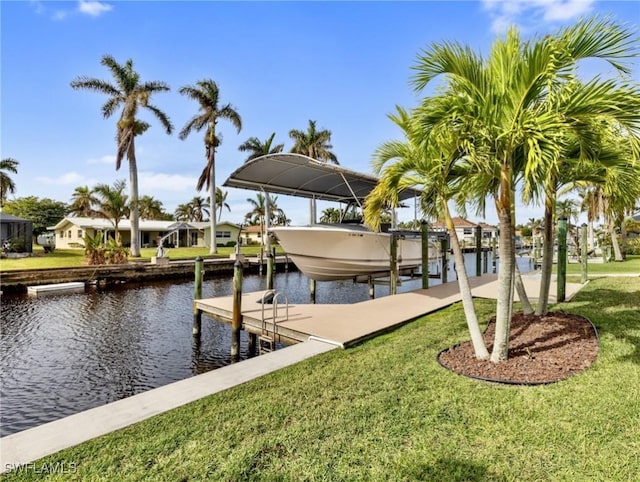 dock area featuring a yard and a water view