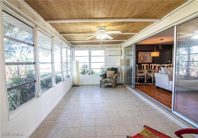 sunroom with a wall unit AC, ceiling fan, and wooden ceiling