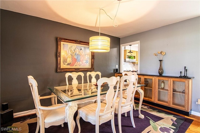 dining room with hardwood / wood-style floors