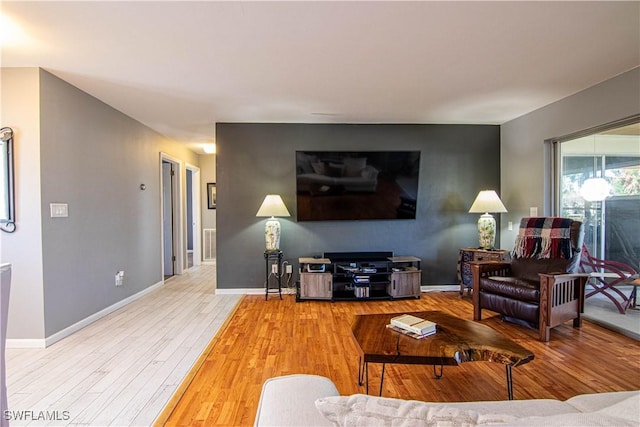 living room with hardwood / wood-style floors