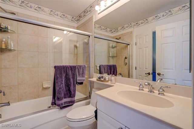 full bathroom with vanity, toilet, and enclosed tub / shower combo