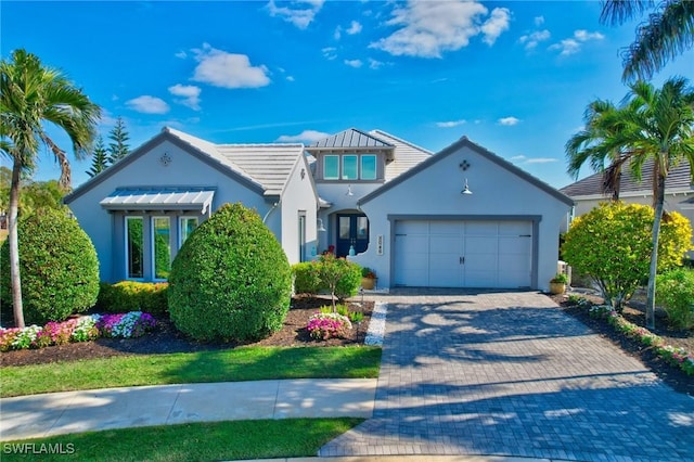 view of front of home featuring a garage