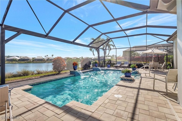 view of swimming pool featuring pool water feature, a water view, a patio, and a lanai