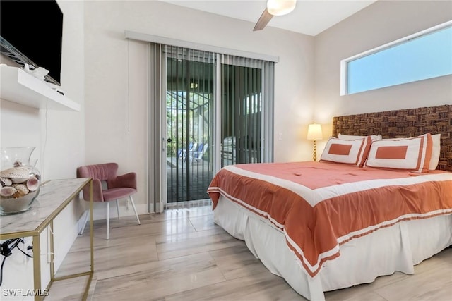 bedroom featuring ceiling fan and access to outside