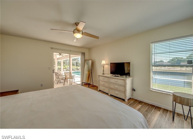 bedroom with ceiling fan, access to outside, and light hardwood / wood-style flooring