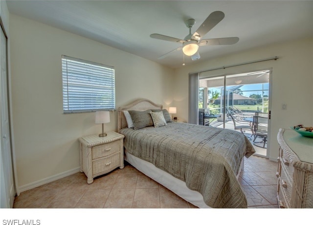 bedroom featuring light tile patterned floors, access to outside, and ceiling fan