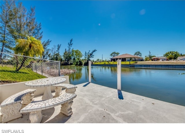 view of patio featuring a water view