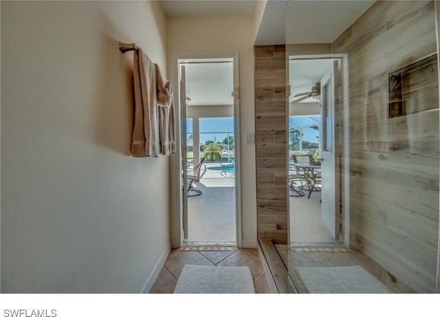 doorway to outside featuring light tile patterned floors