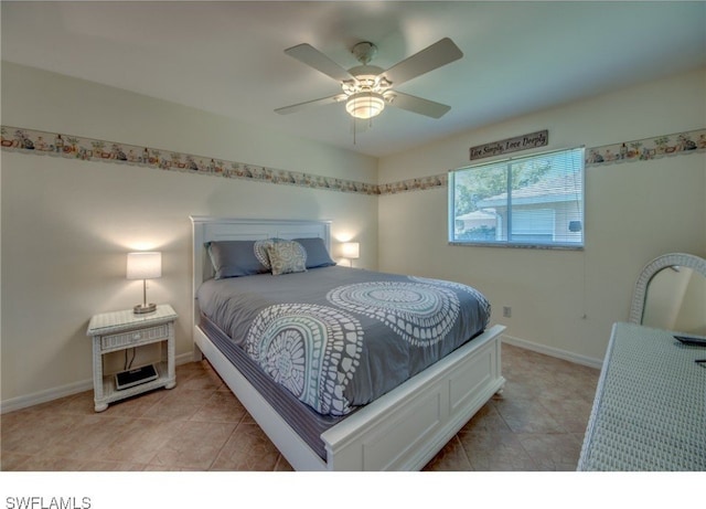 bedroom featuring ceiling fan and light tile patterned floors