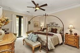 bedroom with crown molding, ceiling fan, and light carpet