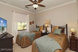 bedroom featuring ceiling fan and crown molding