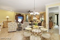 dining area with crown molding, ceiling fan, and light tile patterned floors