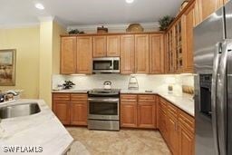 kitchen with appliances with stainless steel finishes and sink