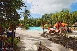 view of jungle gym featuring a patio area