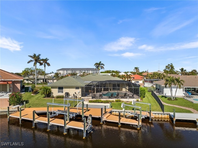 dock area featuring a lanai, a lawn, a water view, and a pool