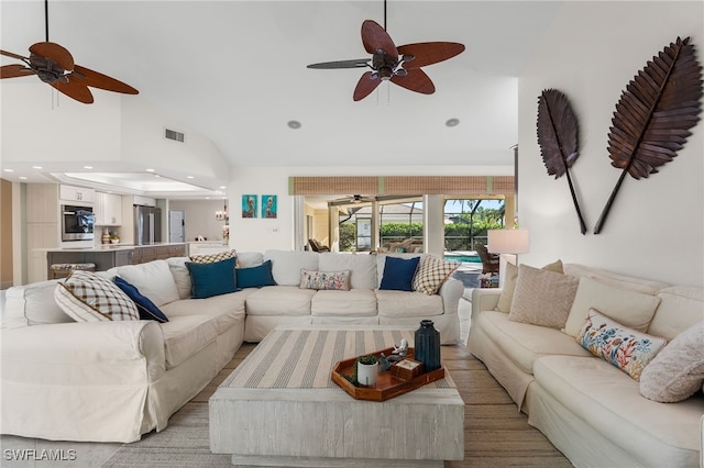 living room with lofted ceiling