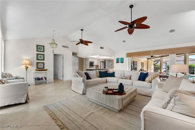 tiled living room with high vaulted ceiling