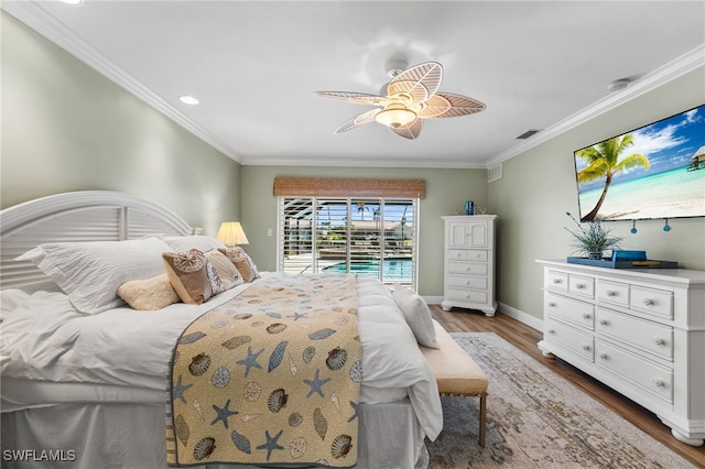 bedroom featuring access to exterior, hardwood / wood-style floors, ceiling fan, and ornamental molding