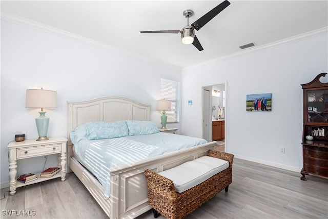 bedroom with hardwood / wood-style floors, ornamental molding, connected bathroom, and ceiling fan