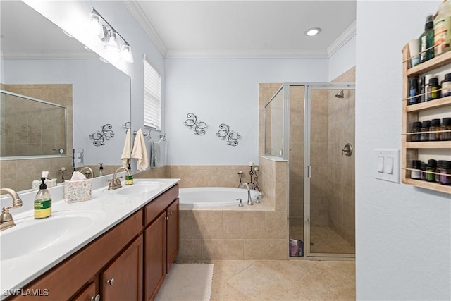 bathroom with vanity, crown molding, tile patterned floors, and plus walk in shower