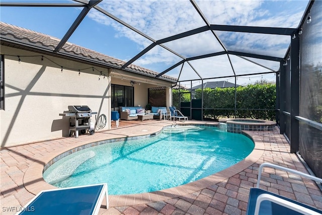 view of pool featuring grilling area, a lanai, a patio, an outdoor hangout area, and an in ground hot tub