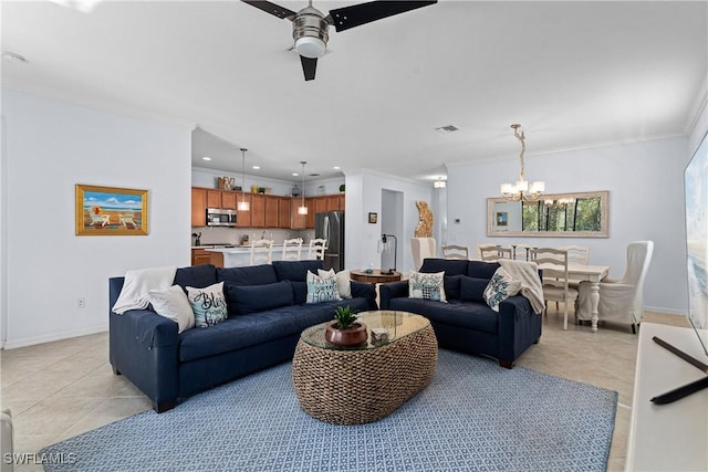 tiled living room featuring crown molding and ceiling fan with notable chandelier