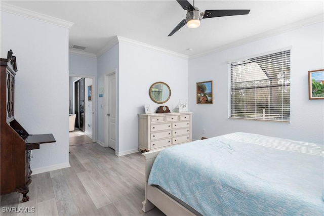 bedroom with crown molding, ceiling fan, and light hardwood / wood-style flooring