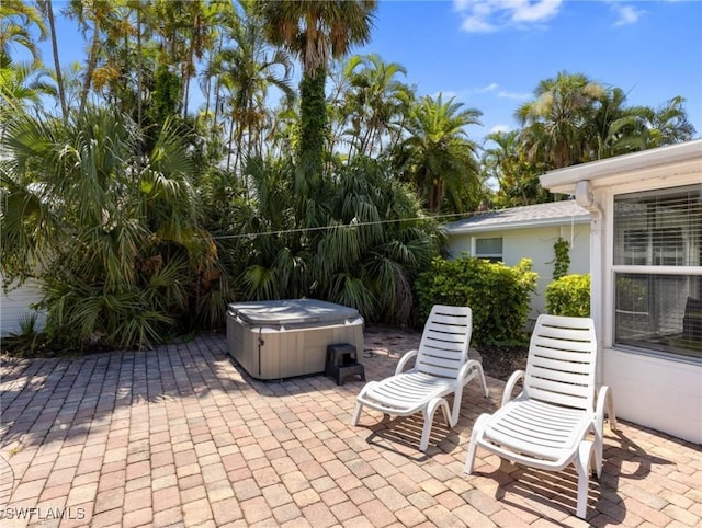 view of patio featuring a hot tub