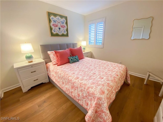 bedroom featuring hardwood / wood-style flooring