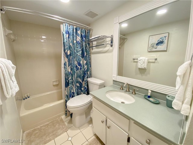 full bathroom featuring tile patterned flooring, shower / bath combo, toilet, and vanity