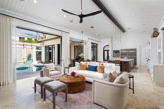 living room featuring ceiling fan, beam ceiling, wooden ceiling, and high vaulted ceiling