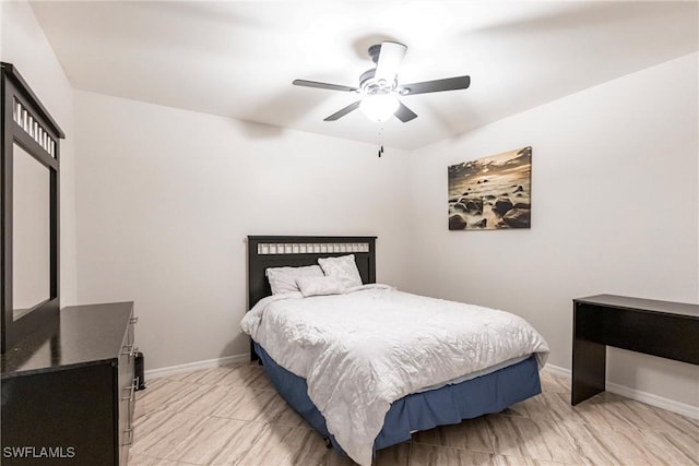 bedroom featuring ceiling fan