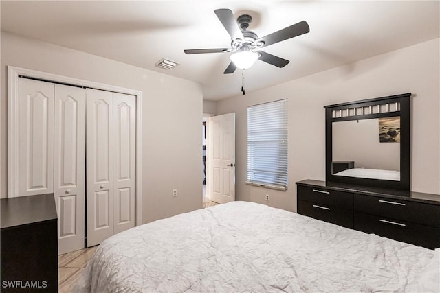 bedroom with a closet and ceiling fan