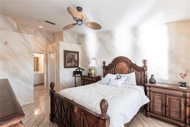 bedroom featuring ceiling fan and connected bathroom