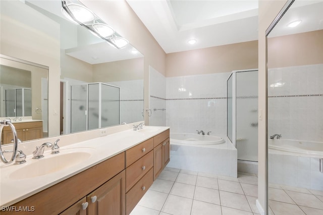 bathroom with vanity, tile patterned floors, and plus walk in shower