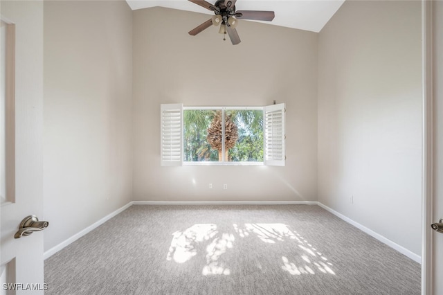 empty room with ceiling fan, light carpet, and lofted ceiling