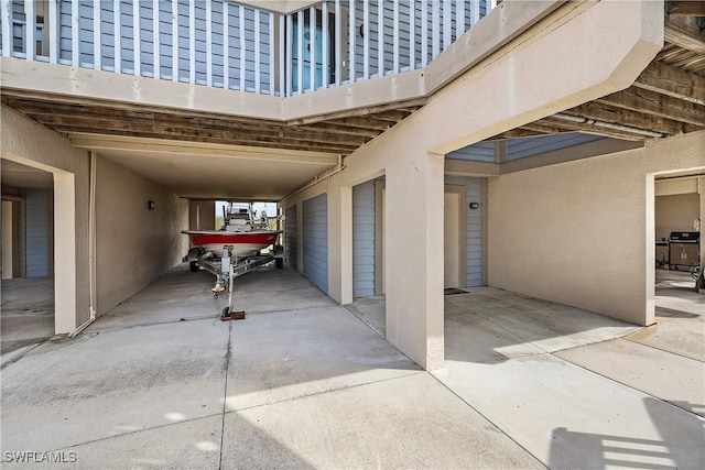 view of patio featuring a carport