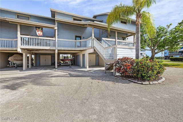 view of front of house with a carport