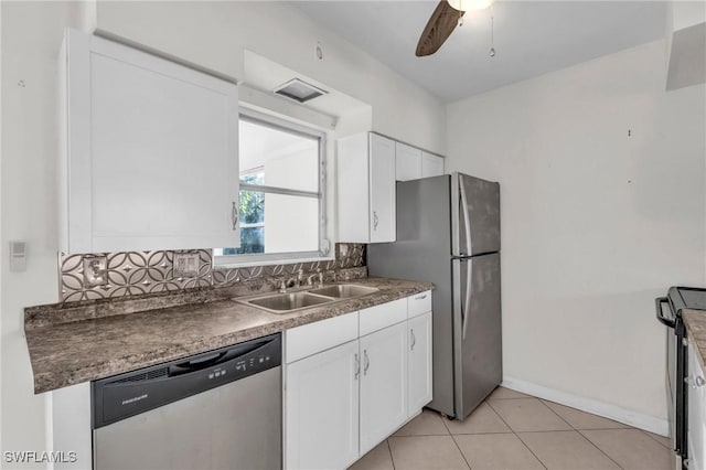 kitchen with white cabinetry, sink, backsplash, ceiling fan, and stainless steel appliances